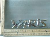 Toyota Yaris Rear Hatch Emblem Nameplate "YARIS" 75442-52370 OEM A1
