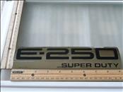 Ford E-250 SUPER DUTY Back Door Emblem Badge Nameplate 9C2Z1542528C OEM A1