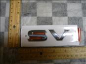 Nissan NV200 Quest Versa Rear Trunk Lid "SV" Emblem Nameplate 90896-1JC0A OEM A1